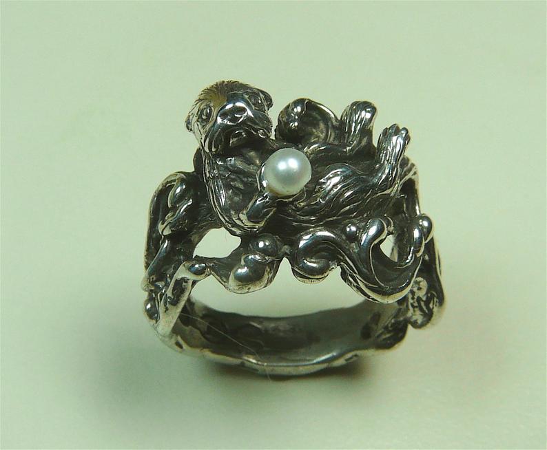 Sterling silver Otter with pearl also available in 14 kt gold Free